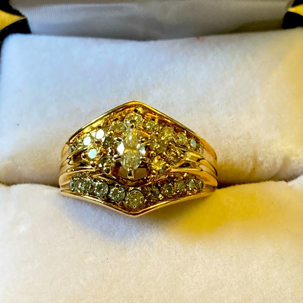 14 carat wedding ring encased and diamonds.